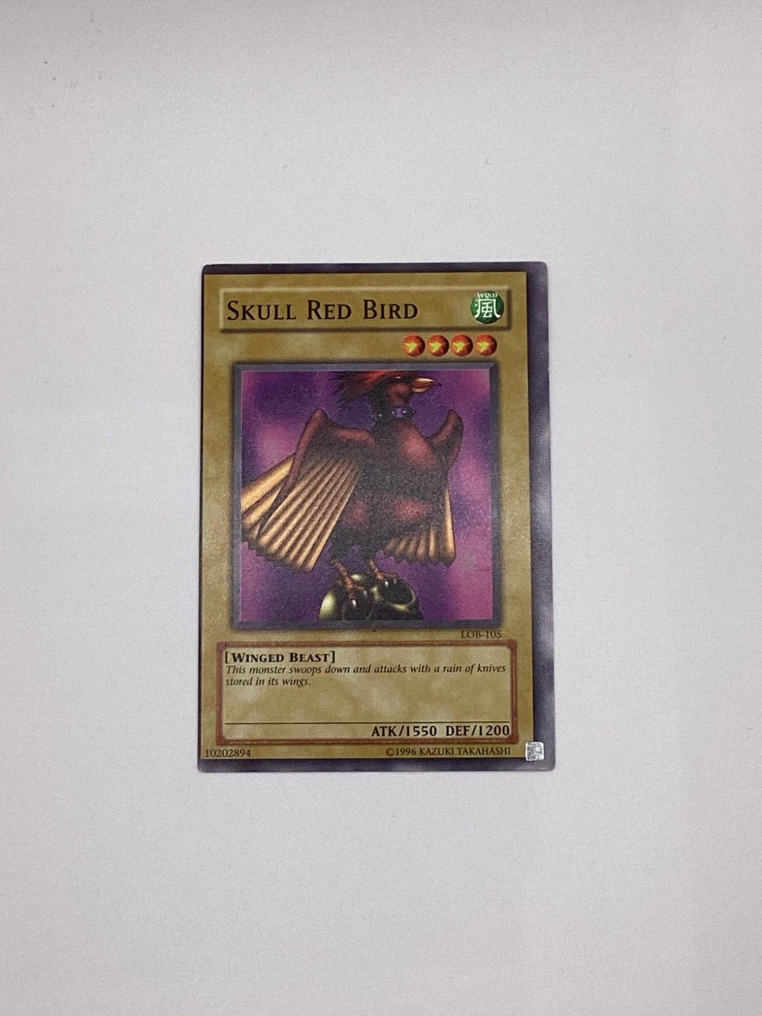 YuGiOh Skull Red Bird - LOB-105 - Unlimited - Miscut - MP